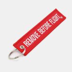 portachiavi remove before flight rosso